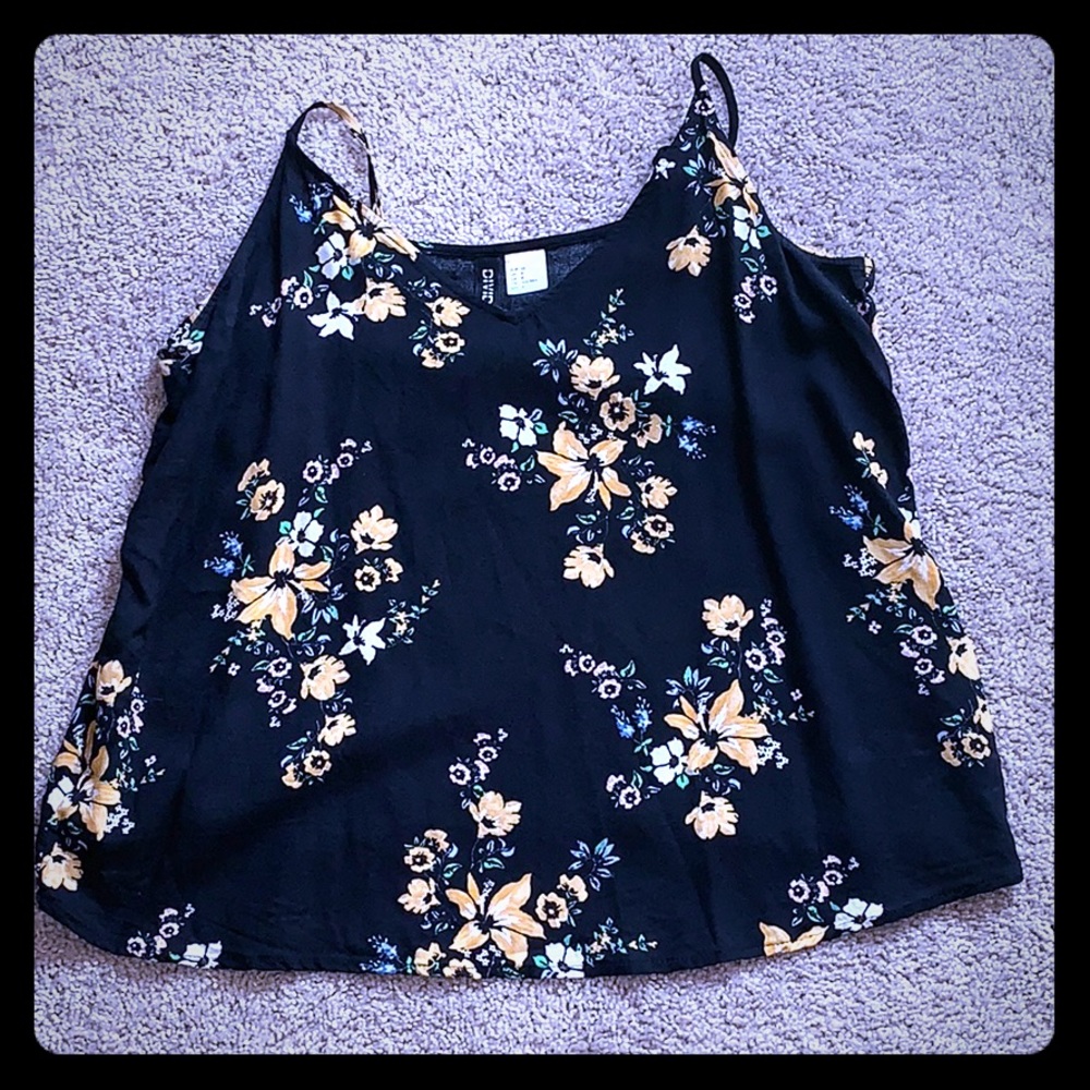 floral blouse.